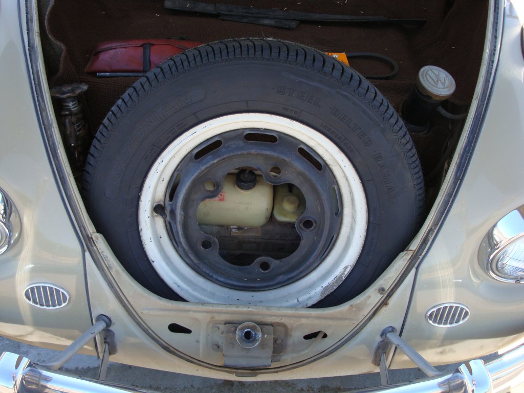 http://www.thesamba.com/vw/scrapbook/67bug_beige/forsale/spare_tire.jpg