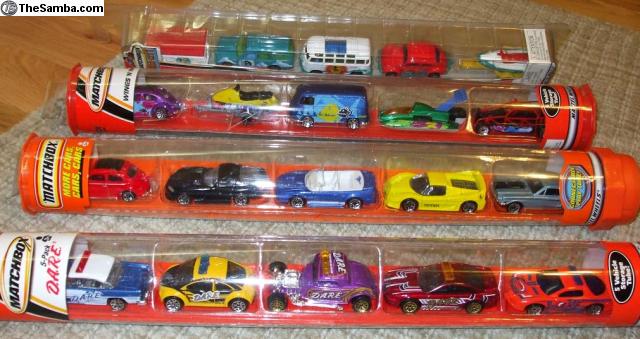 toy cars in a tube