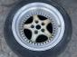 One Porsche Kinesis 17x10.5 inch three piece rim