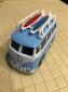 blue white 13 window Volkswagen bus surfboards