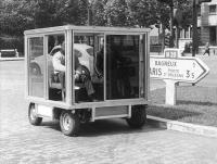 Beetle behind box vehicle