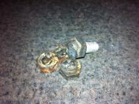 Welded nut to exhaust stud