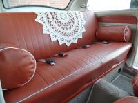 Custom hand-made leather pillows for the rear seat.