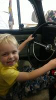 My boy driving our 68 Beetle