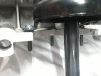 Sump bolt solution