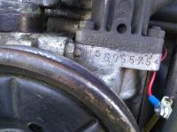 056 distributor with engine and carburetor