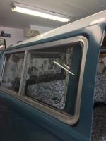 Sliding camper windows