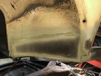 Driver's side wheel well