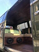 Custom pine wood headliner and flooring mahogany stain