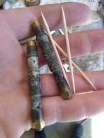 Temporarily modifying emulsion tubes with toothpicks.