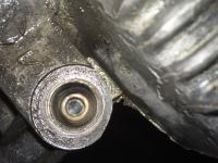 Stuck oil pressure relief piston