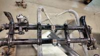 Front beam steering box locating problem