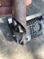 Broken syncro axle (used as a  welder test steel- scrap)