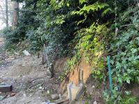 van shelter against the hillside