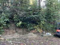 van shelter against the hillside