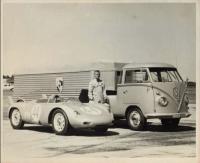 A VW type 1 tractor with trailer attached