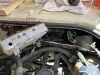 1986 Subaru westy back right engine compartment