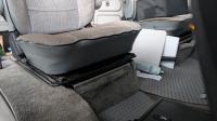 Front seat drawer lock box storage