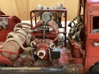 Unknown tin split window fire truck toy