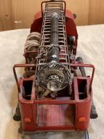 Unknown tin split window fire truck toy