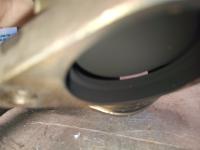A gap in the seat of the waste gate