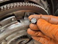 Fuel line oil cooler clutch mounting bolt