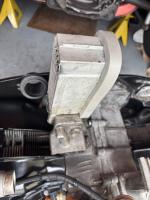 Fuel line oil cooler clutch mounting bolt