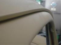 Passenger door top gap