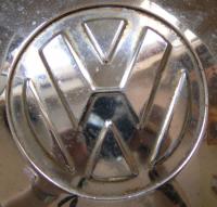 Unknown Hubcap Type Logo Closeup