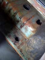 strange holes in rear storage compartment